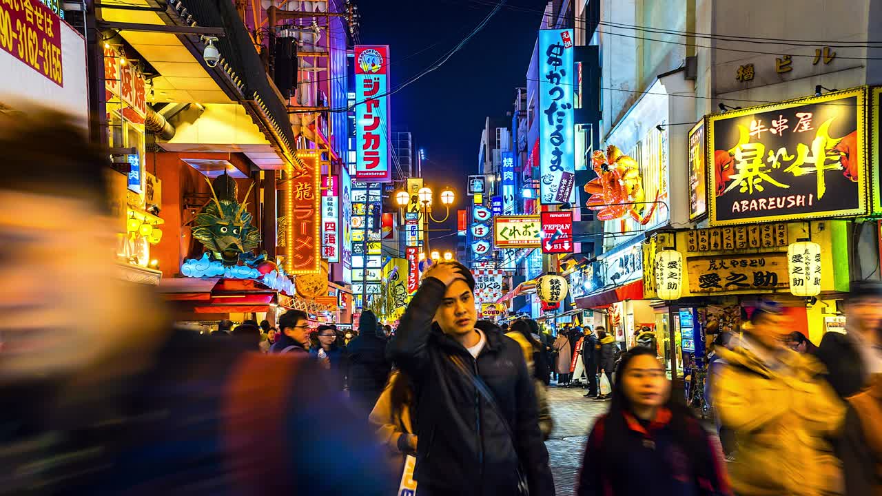 4k.time lapse zona de namba en osaka gente abarrotada en el mercado de la calle namba en osaka japón