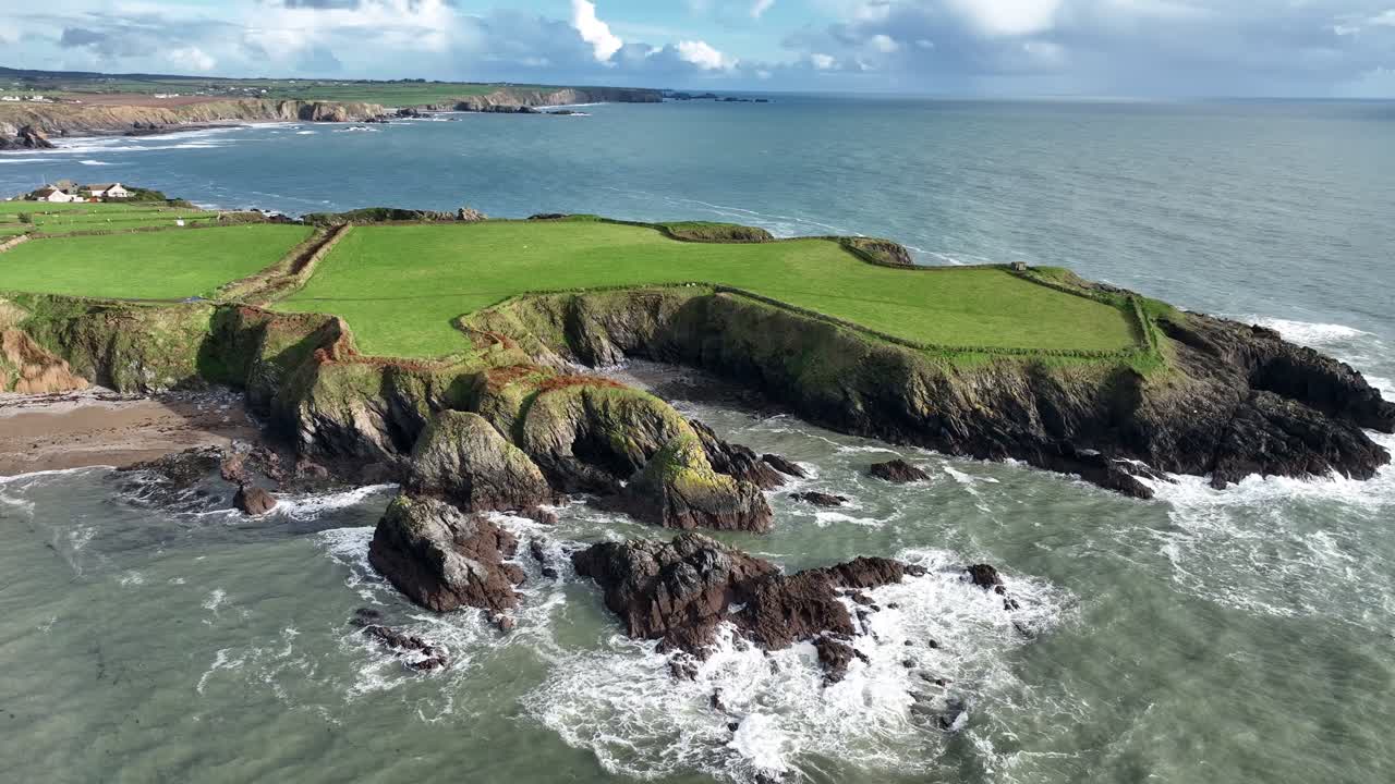 Ireland epic Sea scapes drone flying right looking east over Dunabrattin Headland stunning Copper Coast Waterford