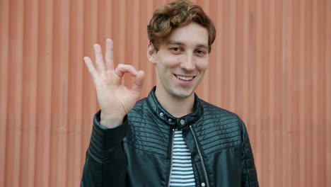 man making ok gesture