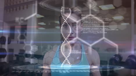 Animation-of-dna-strand-spinning-and-data-processing-over-strong-woman-exercising