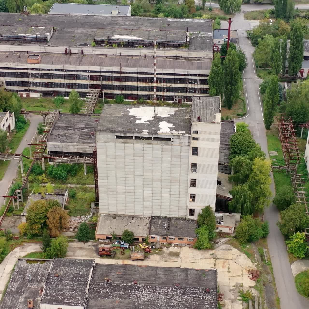 Exterior of industrial destroyed buildings. Destroyed aerial view of huge territory factory