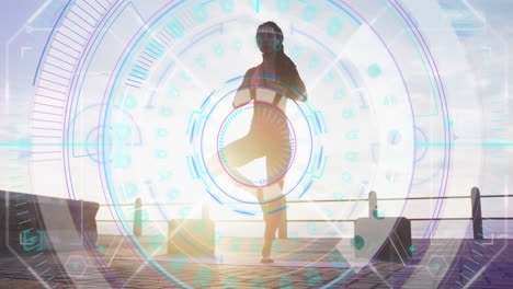 animación de estadísticas y gráficos sobre una mujer practicando yoga en el paseo marítimo