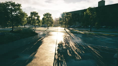 sunset over a parking lot with long shadows