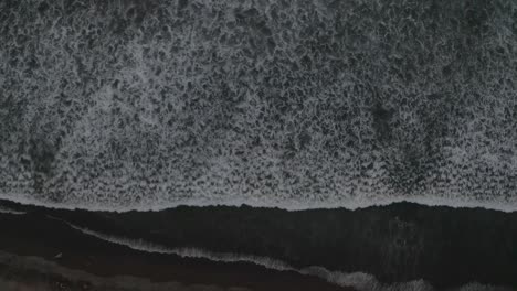 aerial drone birds view shot of the ocean revealing the beach in costa rica 4k