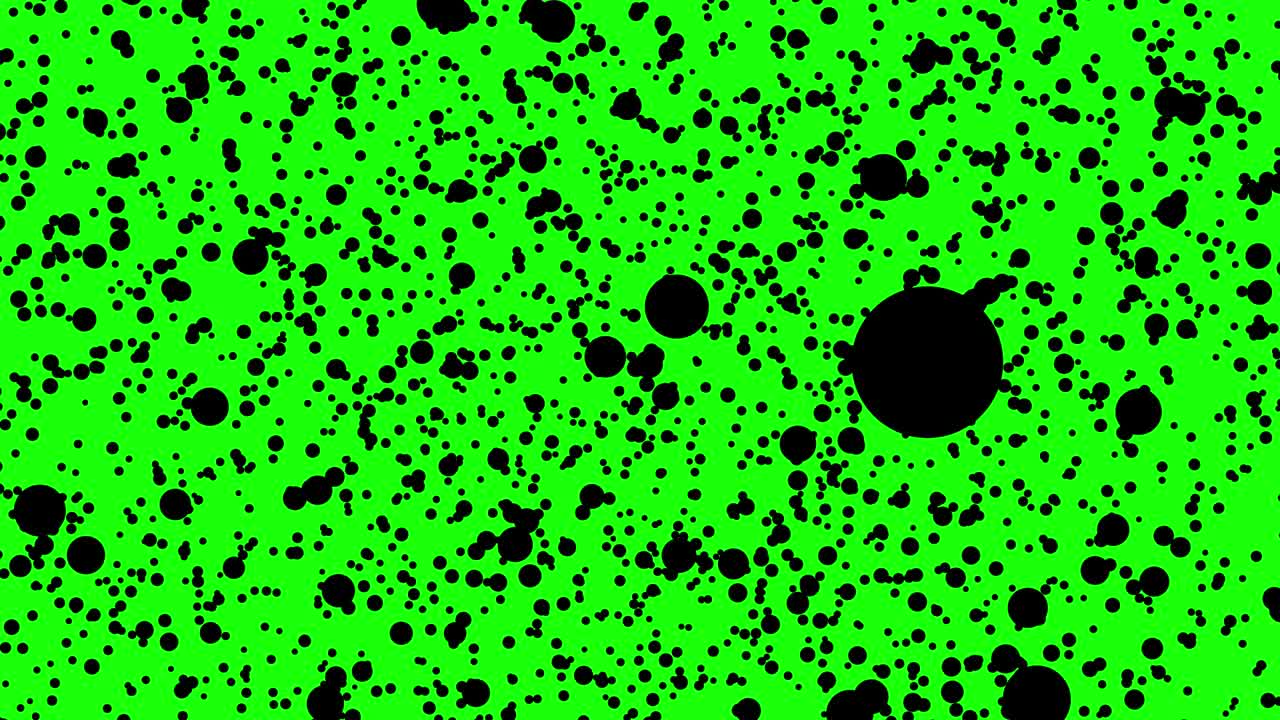 Solid black atoms / particles / gas molecules scattering in front of a green screen, entropy, chroma key, easily isolated