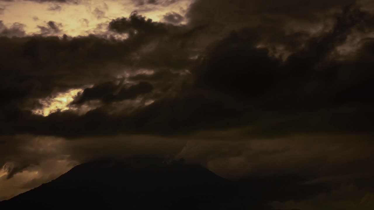Dramatic Lightning Flashes Over Fuego Volcano at Night