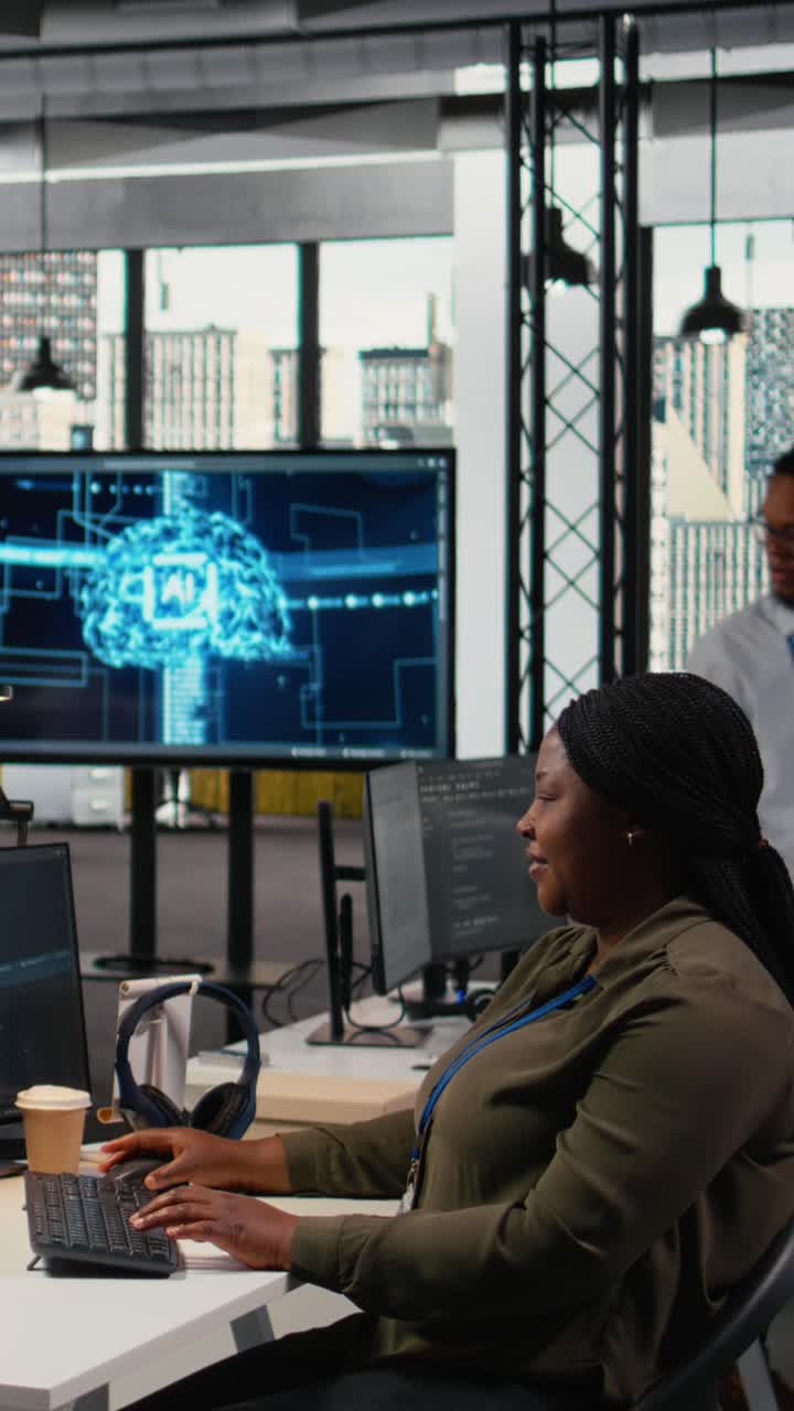 Vertical video System administrators in startup office work with artificial intelligence