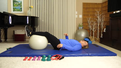 woman showing she is tired from exercising at home, static locked off