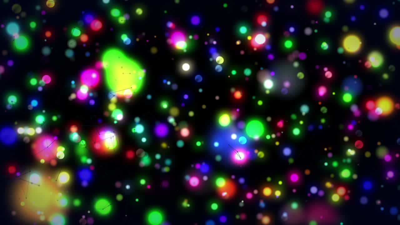 Animazione di punti luminosi e particelle su sfondo nero.