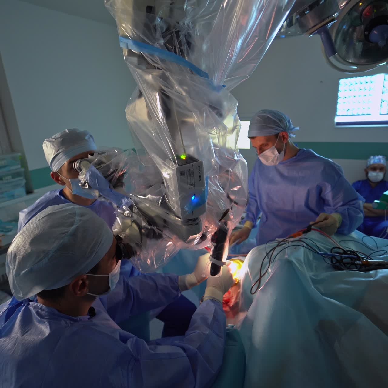 Surgeon specialists working in operating room. Close up work of neurosurgeons