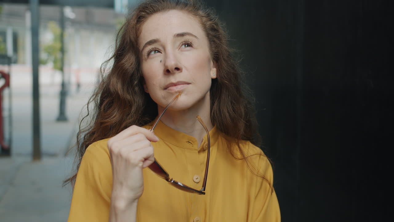 Woman in Yellow Shirt with Sunglasses