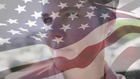 Animation-of-flag-of-america-waving-over-thoughtful-caucasian-mid-adult-woman-looking-away