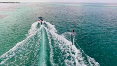 Wakeboarding-in-the-Maldives,-at-the-deep-blue-sea