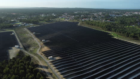 aerial view of vast solar farms near the town in portugal