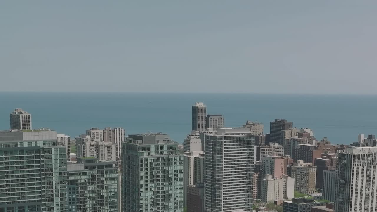 Aerial view of Chicago skyline and Lake Michigan on a clear day