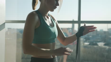 woman preparing for boxing workout