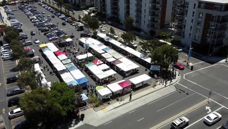 aerial overhead revealing shot at a farmers market