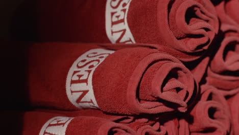 stacked rolled red towels