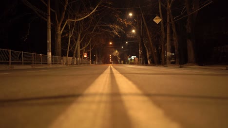 simferopol empty city streets with street lights at night in autumn.