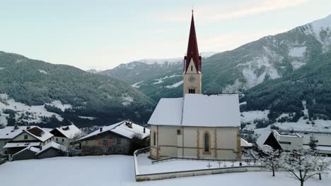 church in a small wintry village in the mountains