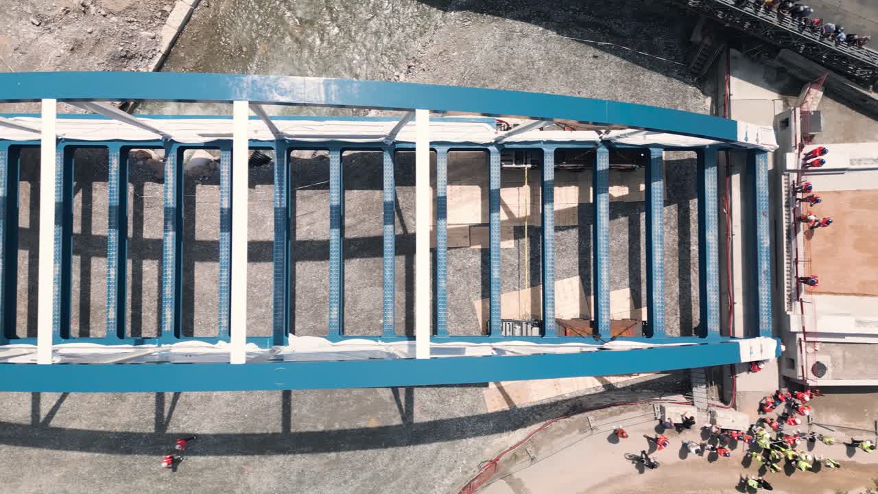 Bridge rigging on a construction site in tende near breil-sur-roya, south of france, aerial view