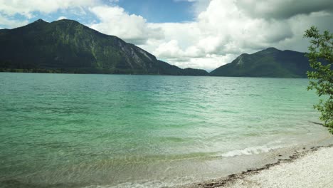 Walking-Through-Forest-to-Beautiful-Mountain-Lake-with-Turquoise-Water