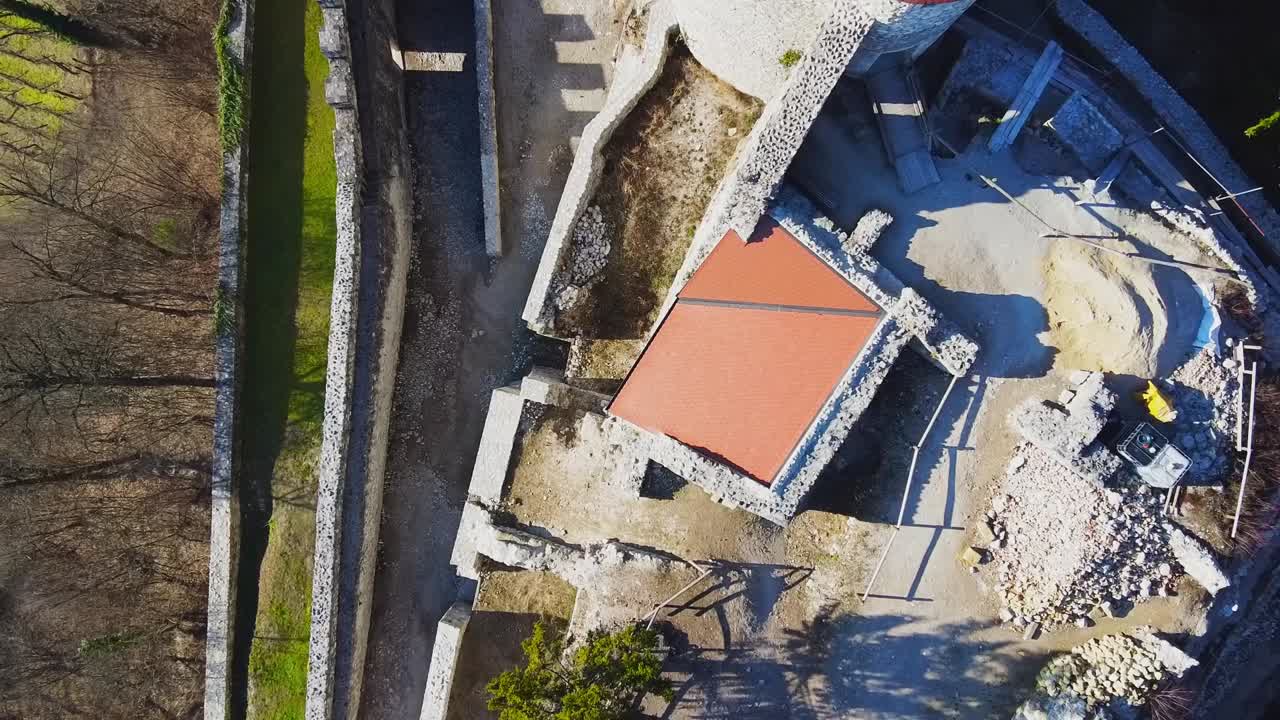 Aerial: Top down view of Zovnek Castle also known as Grad Zovnek, in Braslovce, Slovenia