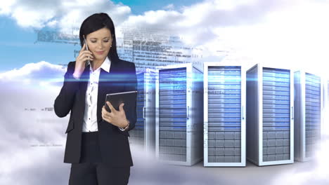 Businesswoman-having-phone-call-and-holding-tablet-computer-in-front-of-server-tower