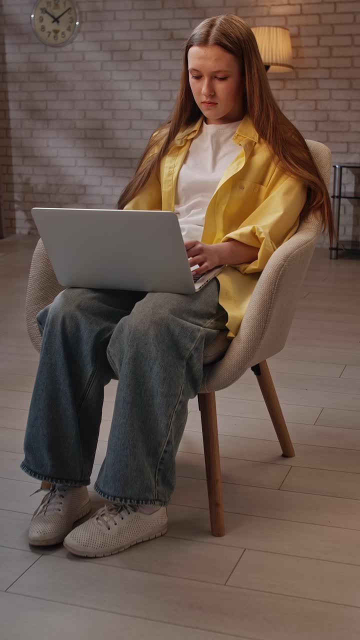 Teenage Girl Working on Laptop