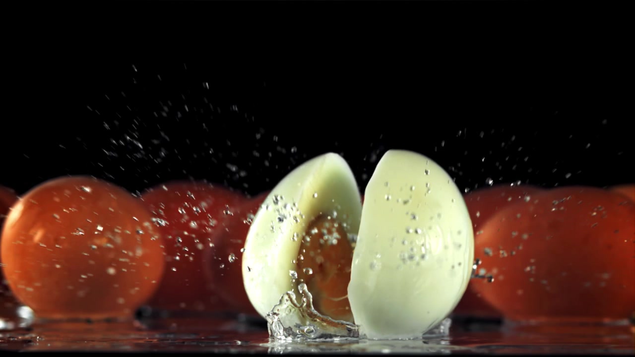 Peeled Hard-Boiled Egg Falls and Splits in Slow Motion