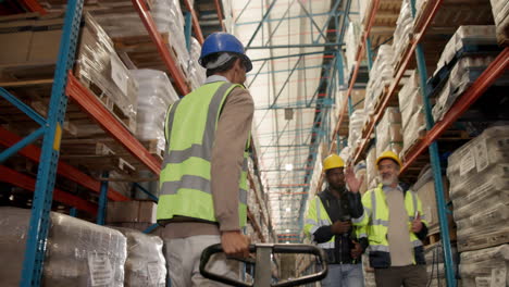 warehouse workers in storage facility