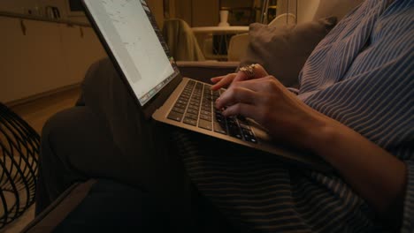 woman working on laptop at home