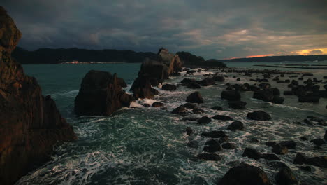 aerial view of hashigui iwa rocks at sunset, wakayama japan