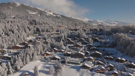 Aerial-shot-in-Switzerland-over-the-town-of-Crans-Montana,-Valais