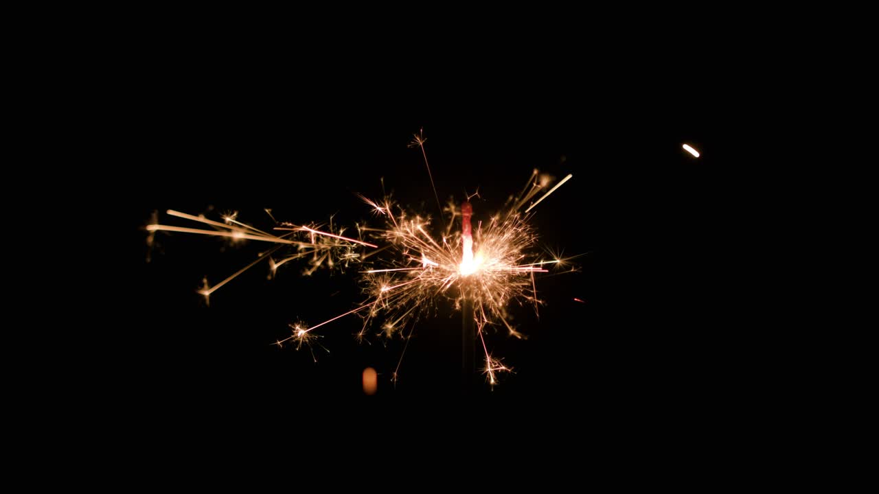 flujo mágico de chispas en la oscuridad