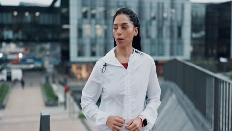 Woman,-fitness-and-running-in-city-for-workout