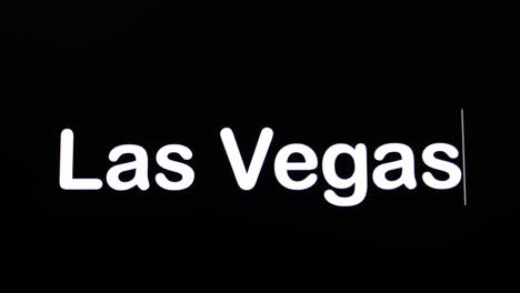 text written on black screen with the word las vegas in white