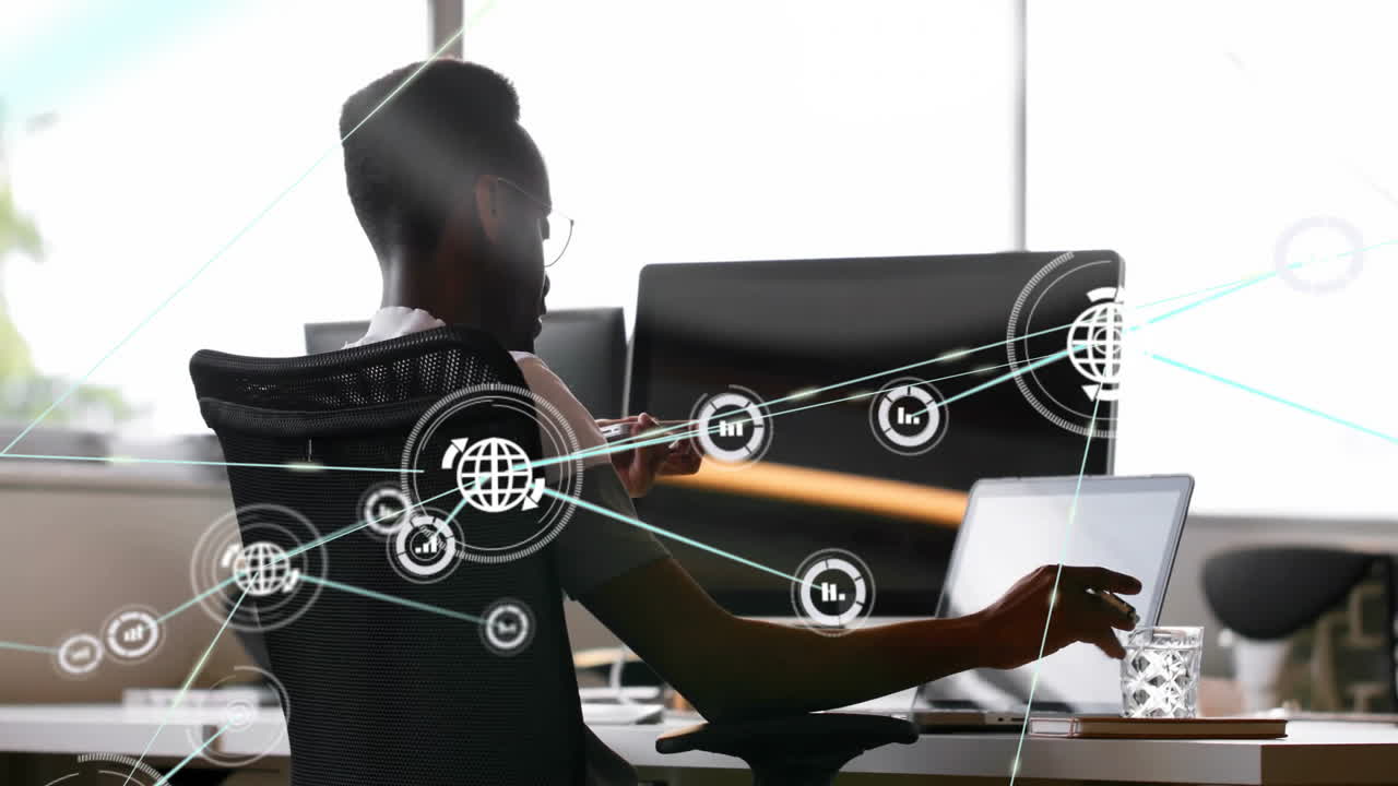 Network connections and data processing animation over person working at desk