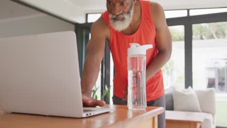 Video-of-african-american-senior-man-practicing-at-home