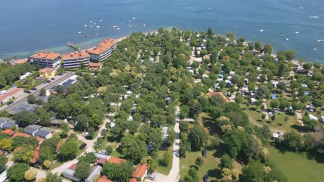 Aerial-Shot-of-Camping-Baia-Verde-on-Shore-of-Lake-Garda,-Italy