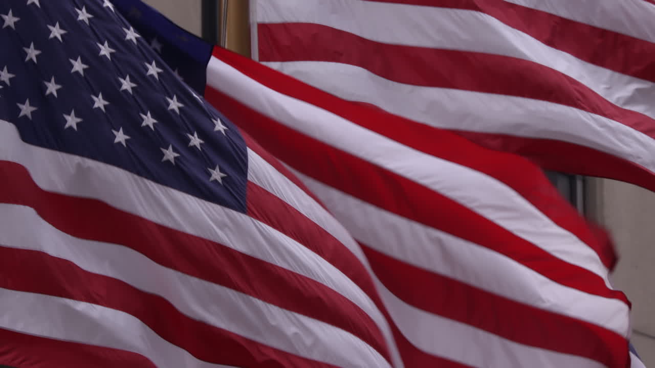 USA United States Of America Flag Waving over Building Facade in New York
