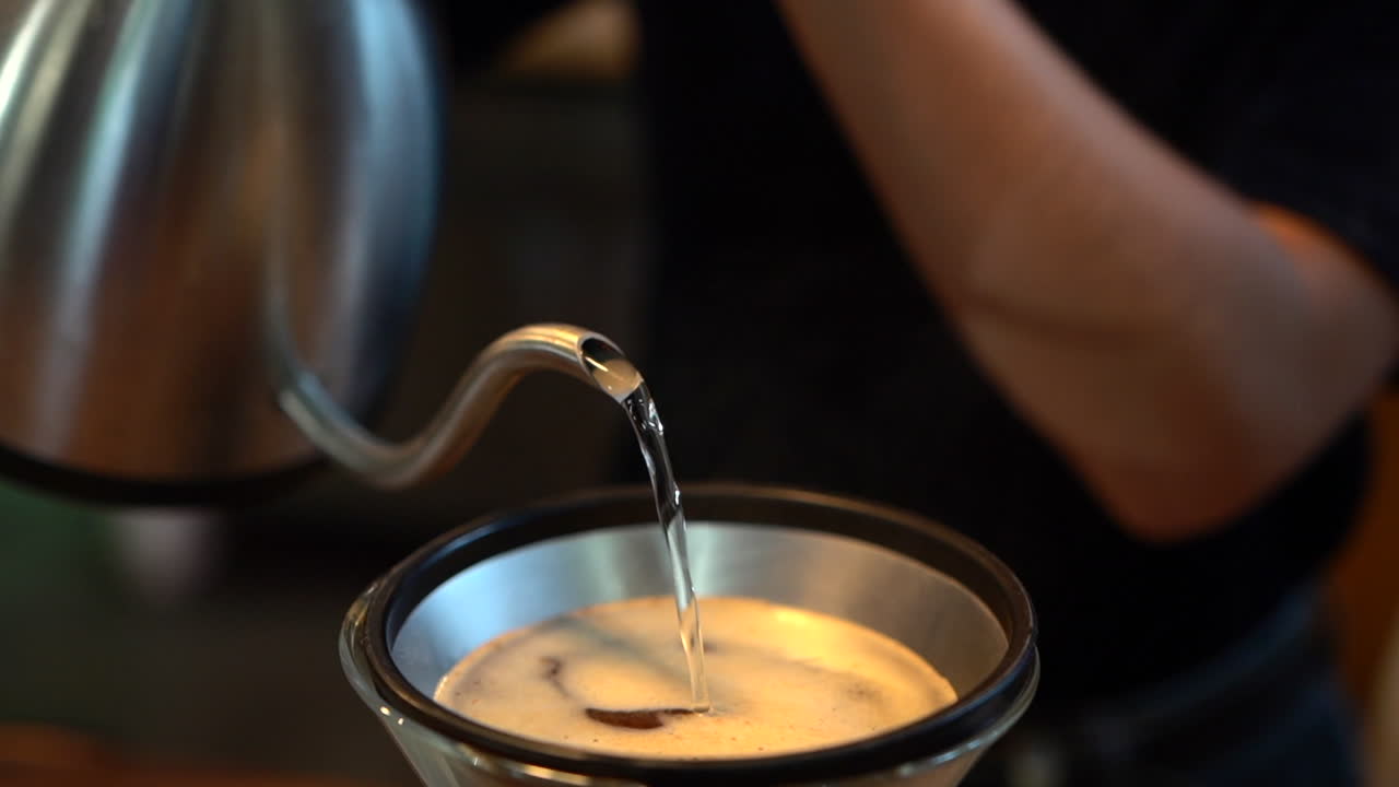 Pouring water in a coffee filter