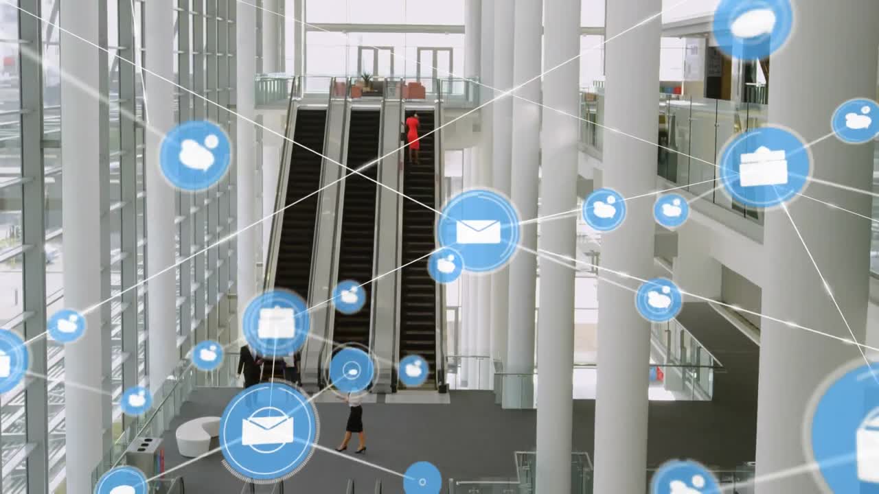 Animation of network of digital icons over aerial view of escalators at modern office
