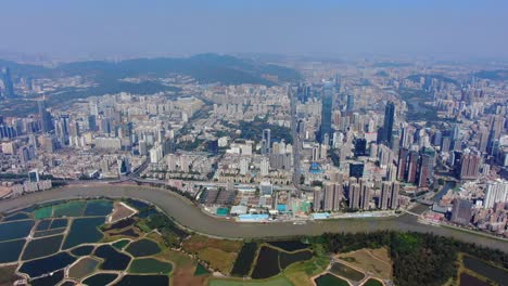 aerial view over shenzhen skyline on a beautiful clear day