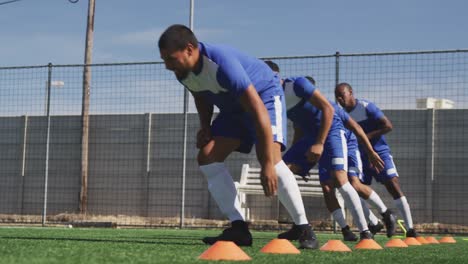 Soccer-players-training-on-field