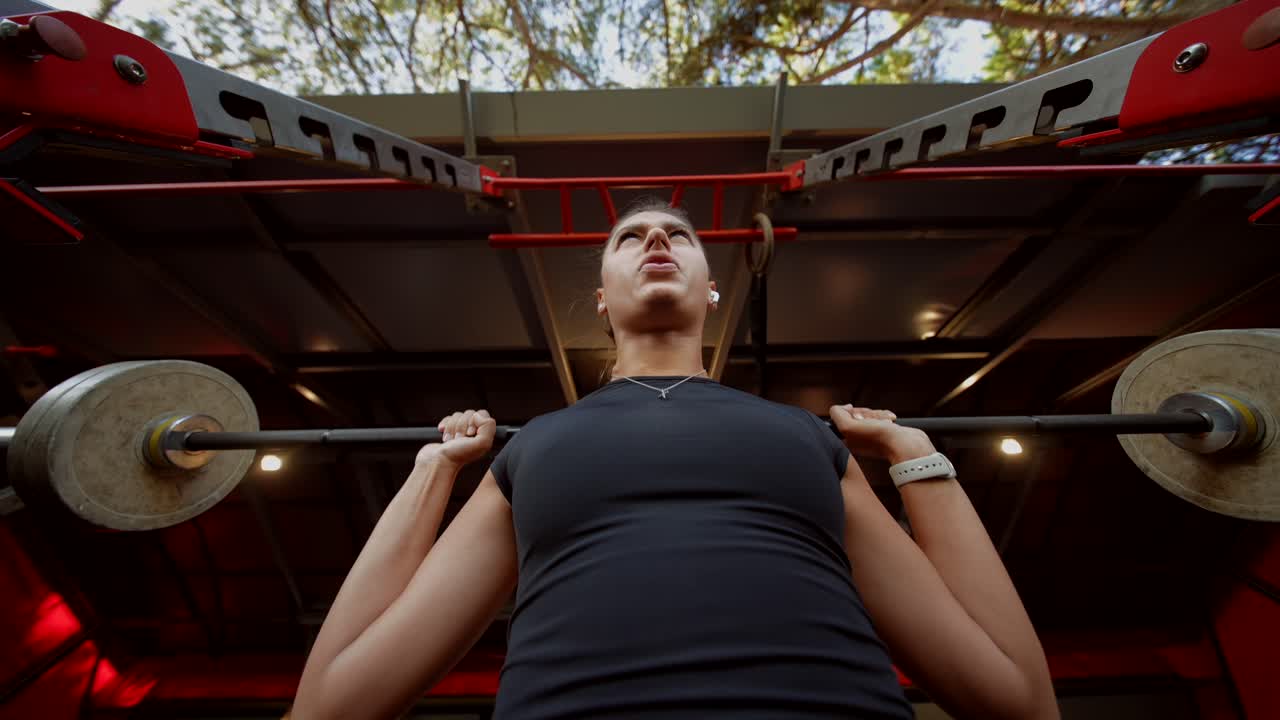 Woman weightlifting and exercising