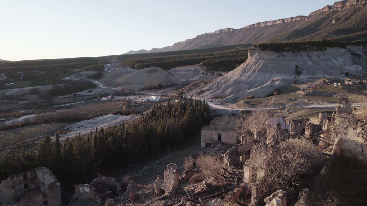 Rocky formations in mountainous terrain on sunny day. Embalse de Yesa, Spain