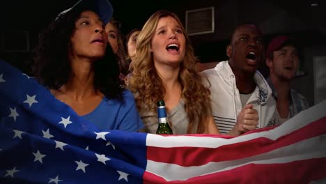 enthusiastic fans cheering during a sports match 4k