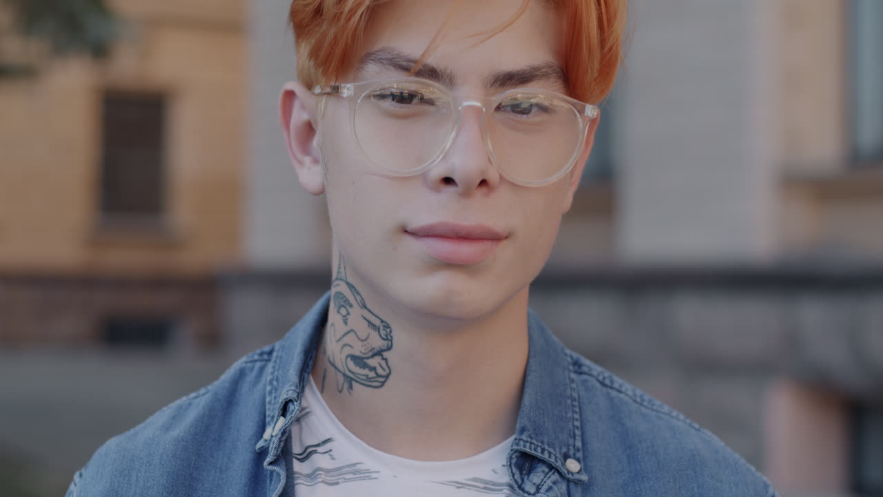 Young Man with Red Hair and Glasses