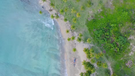 Helicopter-on-caribbean-Esmeralda-beach,-Miches-in-Dominican-Republic